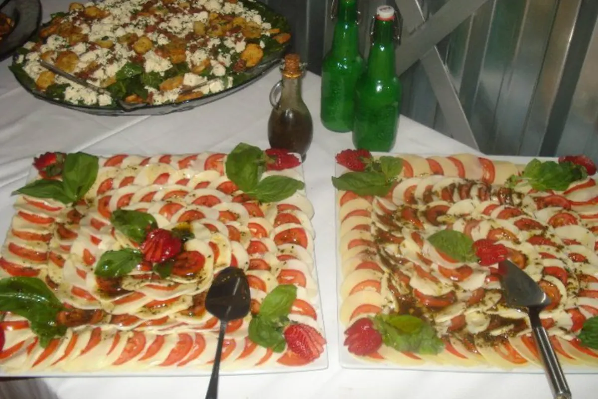 Caprese and salad buffet platters at a catered function in Johannesburg